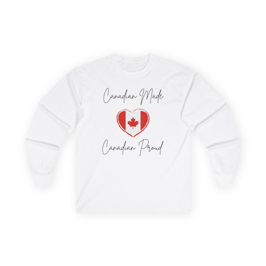 On the front of this custom Canadian patriotic long sleeve t-shirt are the words Canadian Made Canadian Proud in a beautiful cursive font, there is a Canadian flag in the middle that is in the shape of a heart.