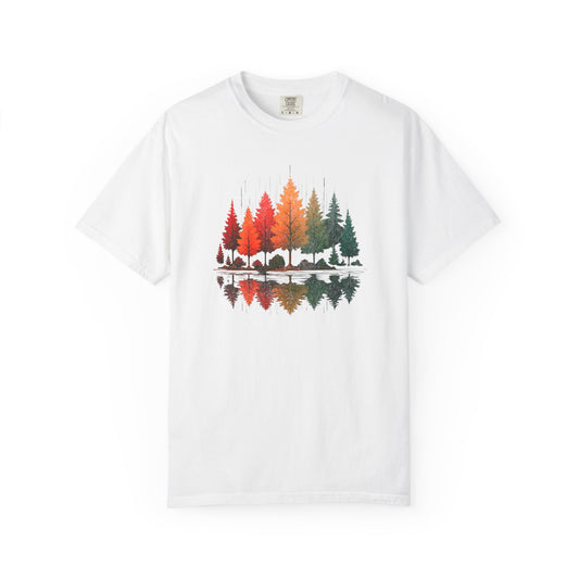 On the front of this custom comfort colors short sleeve shirt is a image of trees in the fall time with all the different fall colors, the trees reflection is right underneath making them look like they are above water.