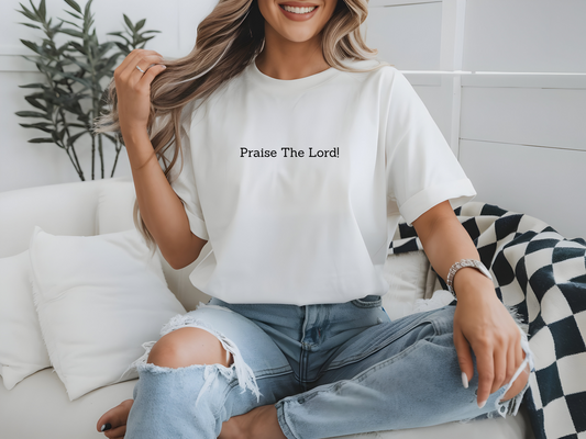 On the front of this custom Christian short sleeve shirt are the words Praise The Lord in a minimalistic font on the front center of the t-shirt.