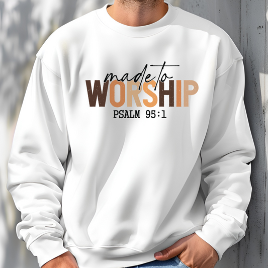 On the front of this Christian pullover sweatshirt it says Made To Worship Psalm 95:1, the word worship is done in large block letters with every letter being a different shade of brown.