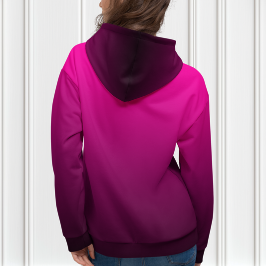 A handmade custom women's pullover hooded sweatshirt that has an ombre design with the top of the hoodie being a bright hot pink then it gradually fading to a very deep purple at the bottom of the hoodie.