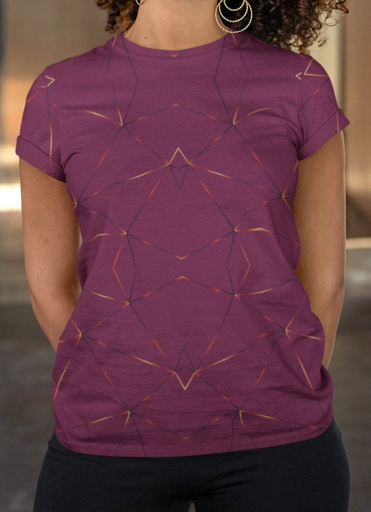 This custom designed handmade women's t-shirt is maroon in color with gold lines throughout the shirt in a geometric patterns, the lines are different shades of gold making it look like it is glowing on the shirt.