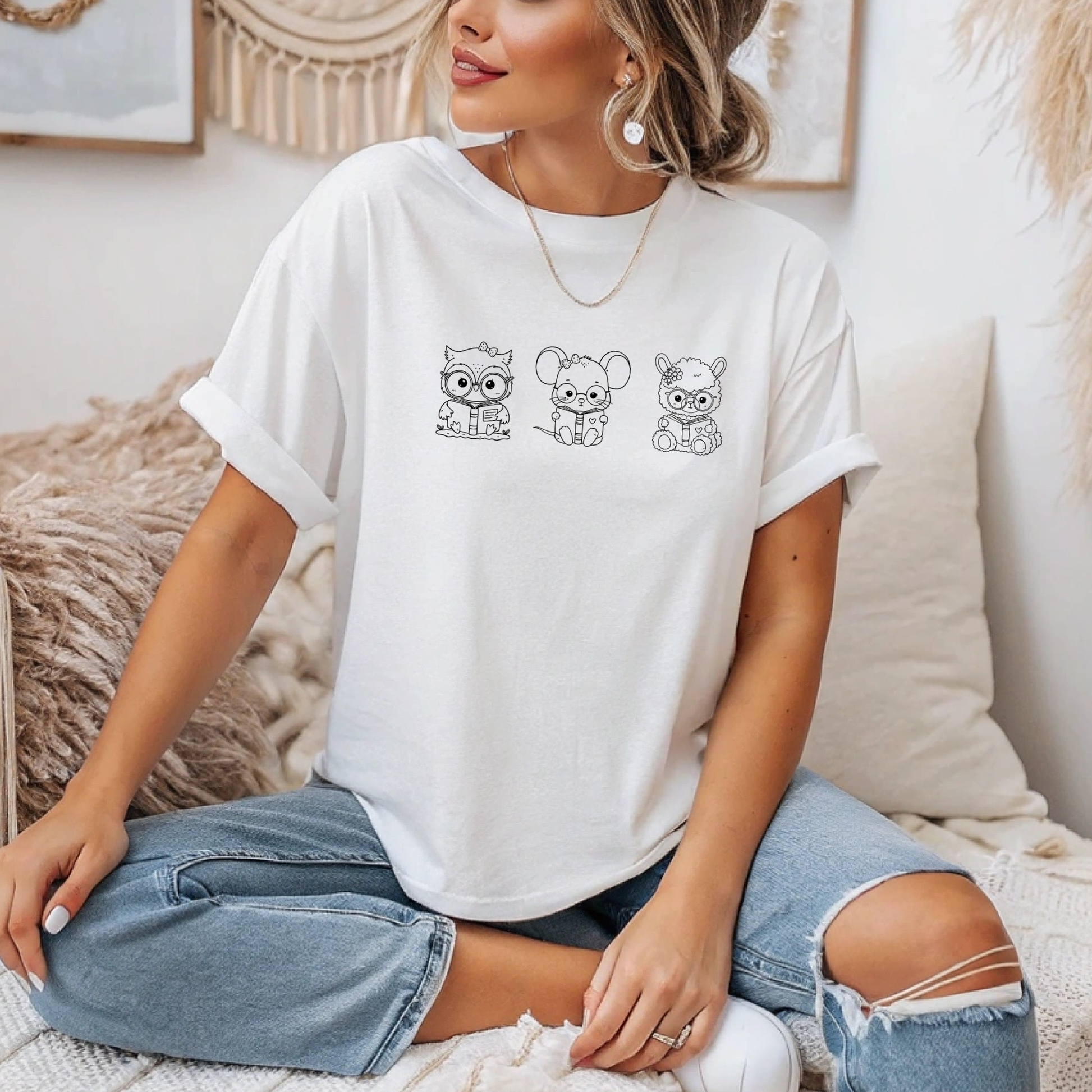 On the front of this custom women's shirt are three baby farm animals with the first being a baby owl then a baby mouse and the last one is a baby lamb, all three of the animals have glasses on and are reading books.