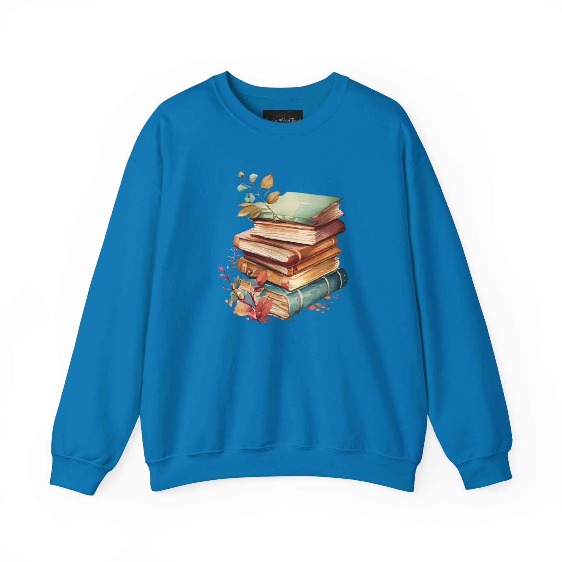 On the front of this custom book lovers sweatshirt is a stack of vintage books with a bunch of wildflowers all around the books.