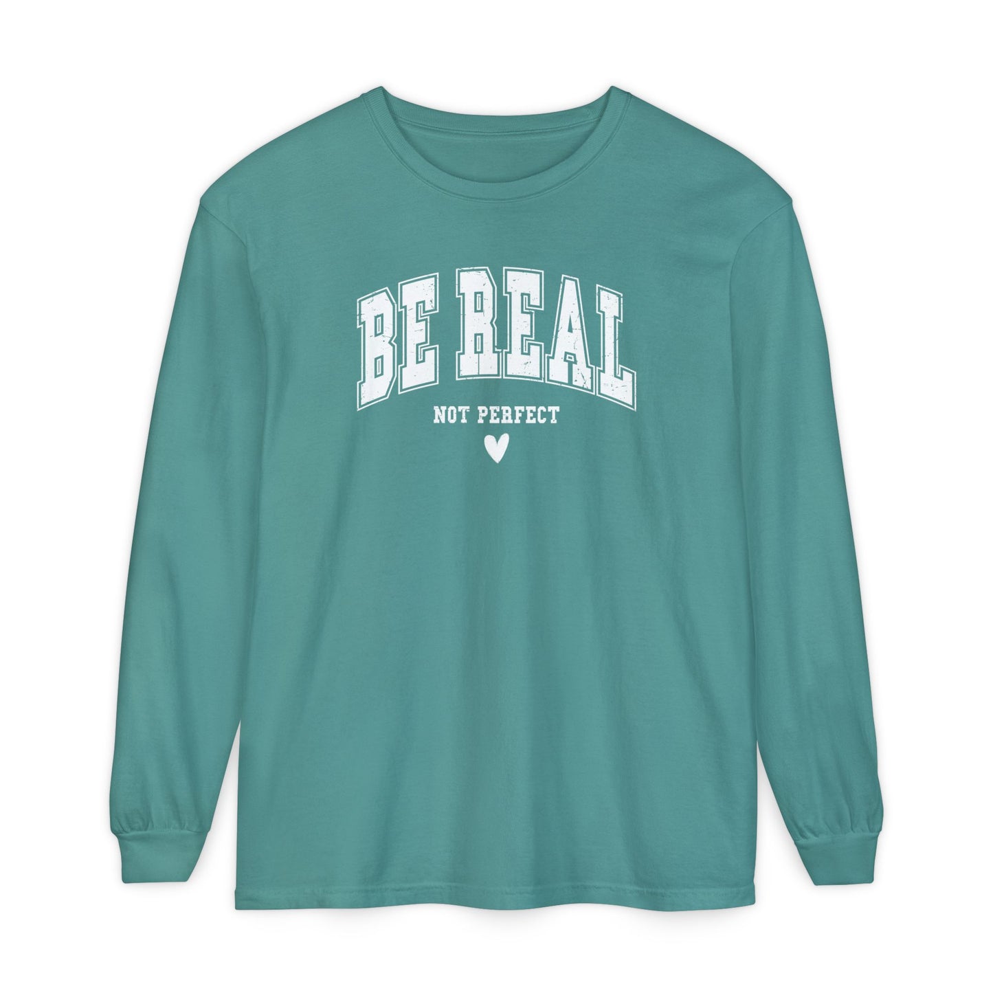 On the front of this custom unisex long sleeve shirt are the words Be Real in large bubble font with the words not perfect underneath the bubble letters, on the bottom there is a heart.