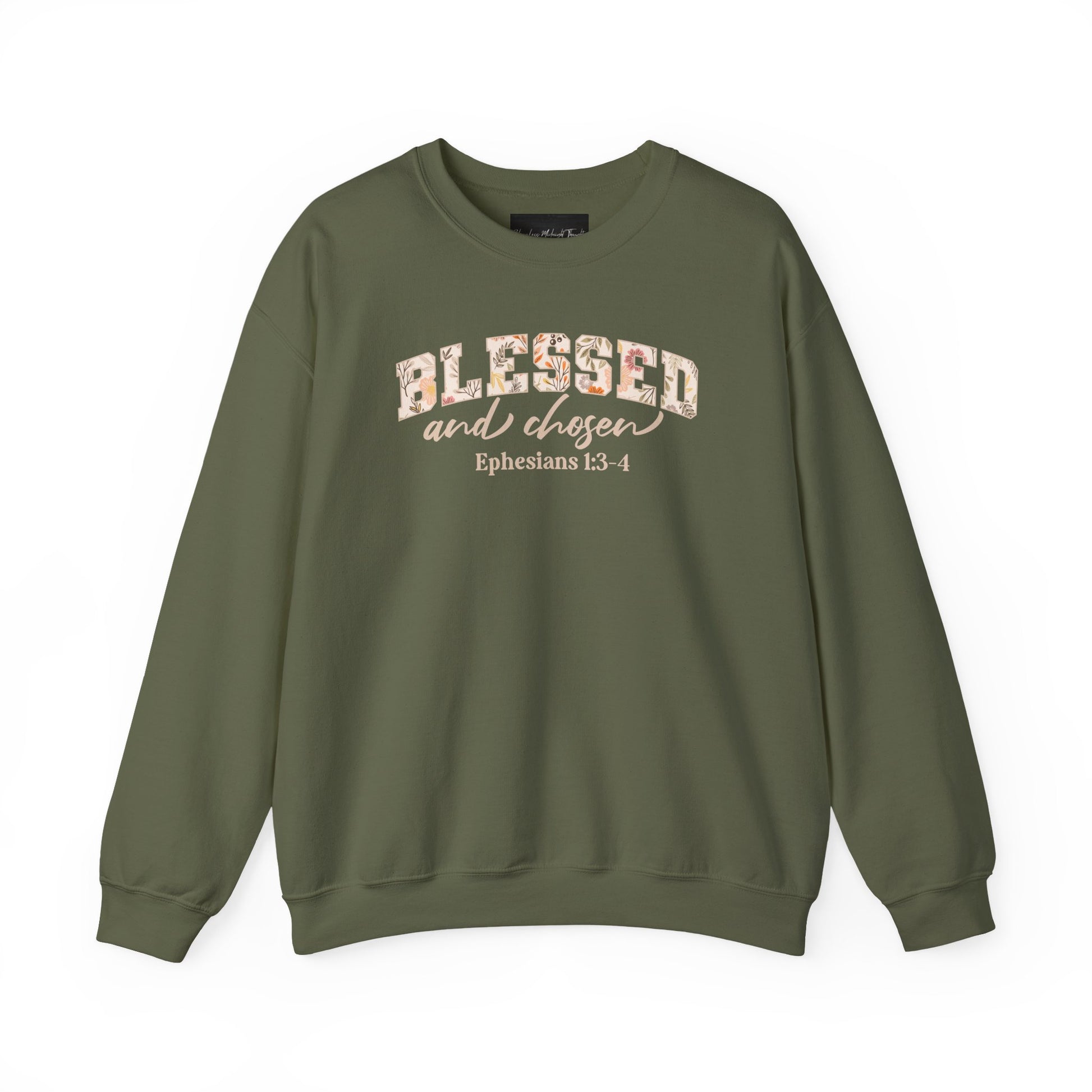 On the front of this custom Christian sweatshirt is the bible verse Blessed and Chosen Ephesians 1:3-4 with the word Blessed being in large bubble letters with a floral pattern on the inside of the letters.