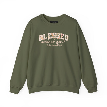 On the front of this custom Christian sweatshirt is the bible verse Blessed and Chosen Ephesians 1:3-4 with the word Blessed being in large bubble letters with a floral pattern on the inside of the letters.