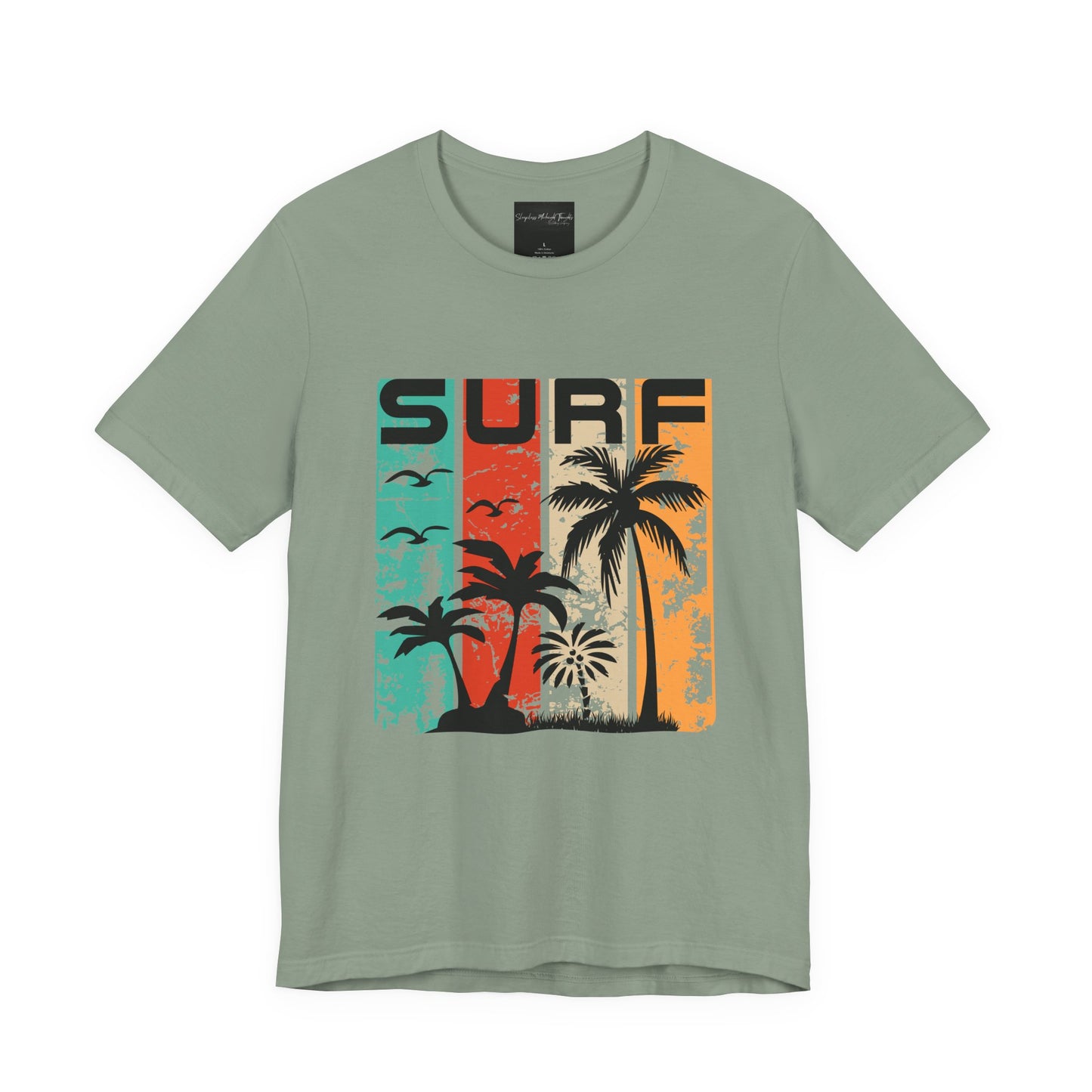On the front of this custom vacation shirt is the word SURF in large letters at the top of the shirt, each letter has a different colored line through it to the bottom, there are images of palm trees and birds flying underneath the word.