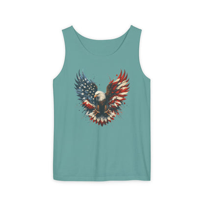 On the front of this unisex tank top is an image of an American Bald Eagle with it's wings out, the feathers of the bald eagle are the colors of the American flag being red, white and blue, there are also stars on one side of the eagle’s wings.
