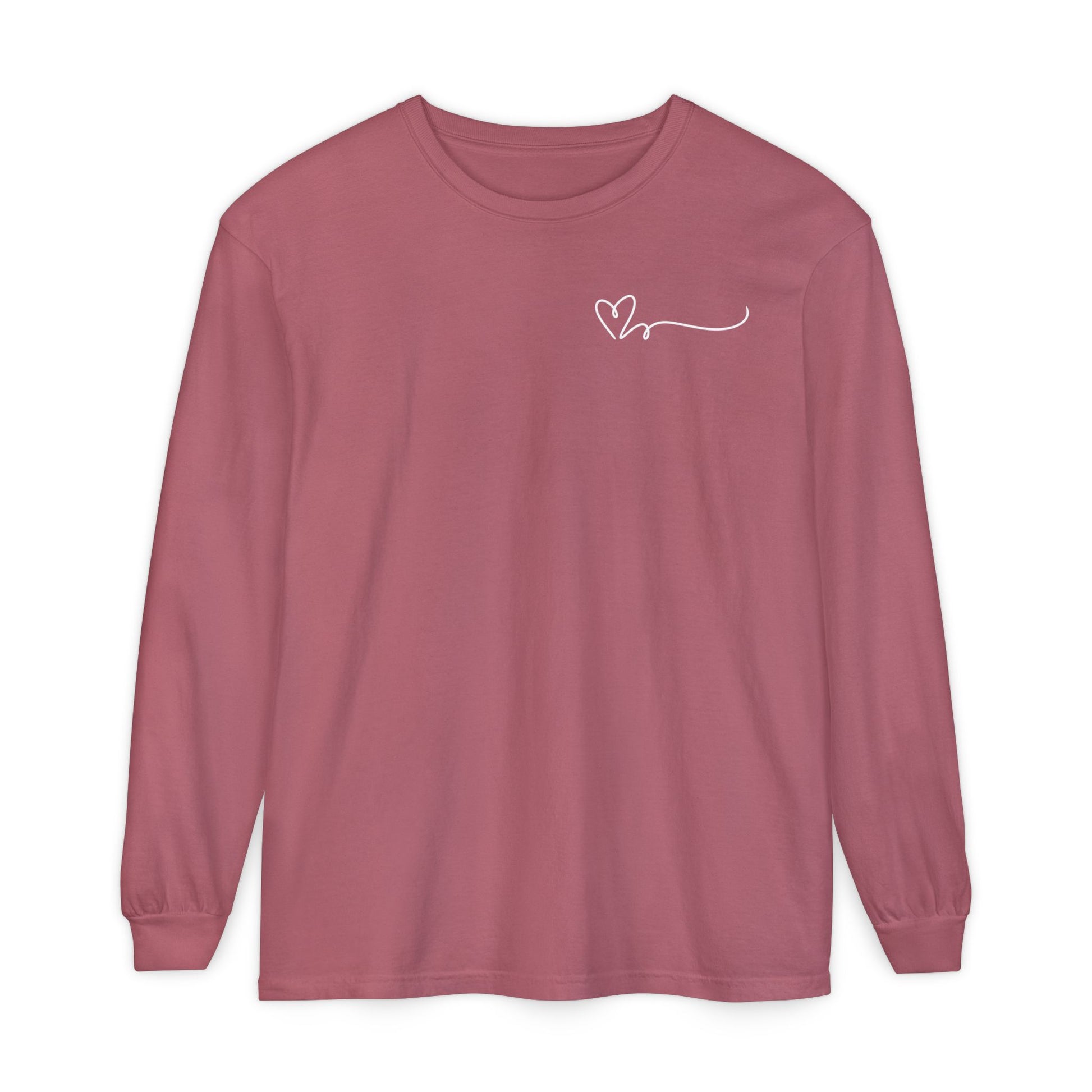 On the top right chest of this custom long sleeve t-shirt is a heart with a trail behind it signifying a heartbeat that you would see on a heart monitor. Perfect for health care workers and teachers.