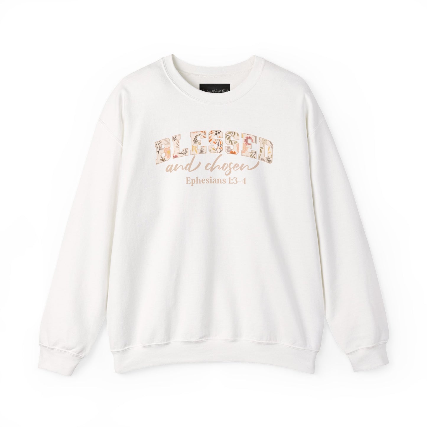 On the front of this custom Christian sweatshirt is the bible verse Blessed and Chosen Ephesians 1:3-4 with the word Blessed being in large bubble letters with a floral pattern on the inside of the letters.