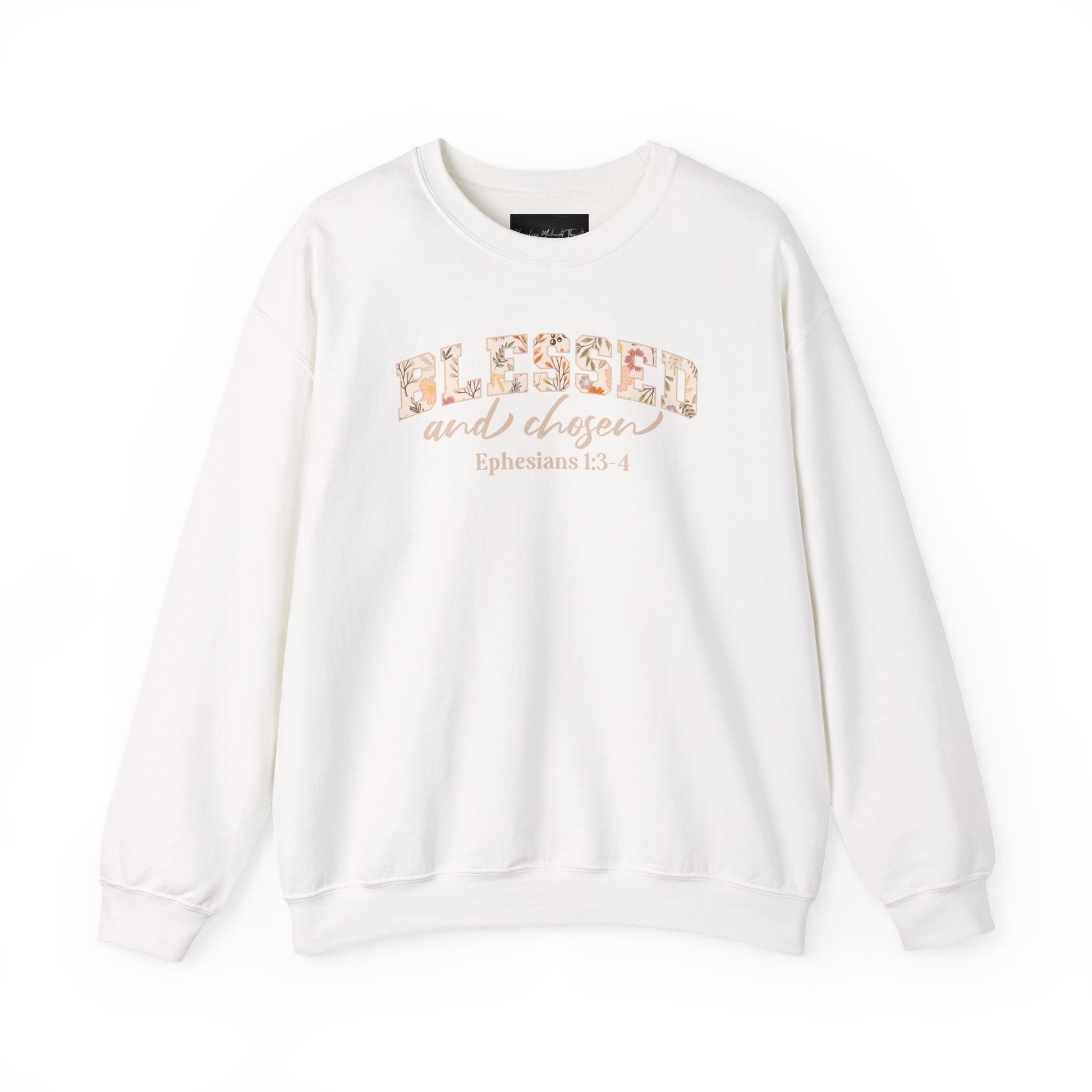 On the front of this custom Christian sweatshirt is the bible verse Blessed and Chosen Ephesians 1:3-4 with the word Blessed being in large bubble letters with a floral pattern on the inside of the letters.