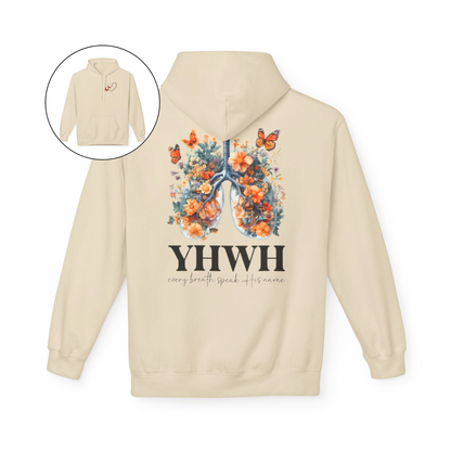 On the front of this custom women's Christian hoodie is a large heart that has a Jesus cross in the center of it, there are two butterflies around the heart. On the back of the sweater is an image of a pair of human lungs made from flowers and butterflies, under the image it says YHWH every breath speaks His name.