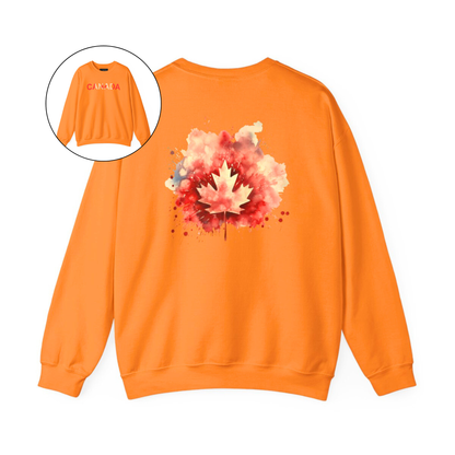 On the front of this Canadian pride pullover sweater is Canada in red and beige letters with a maple leaf in the middle, on the back of the sweater is a large maple leaf that looks like it has been spray painted onto the sweater in red and beige.