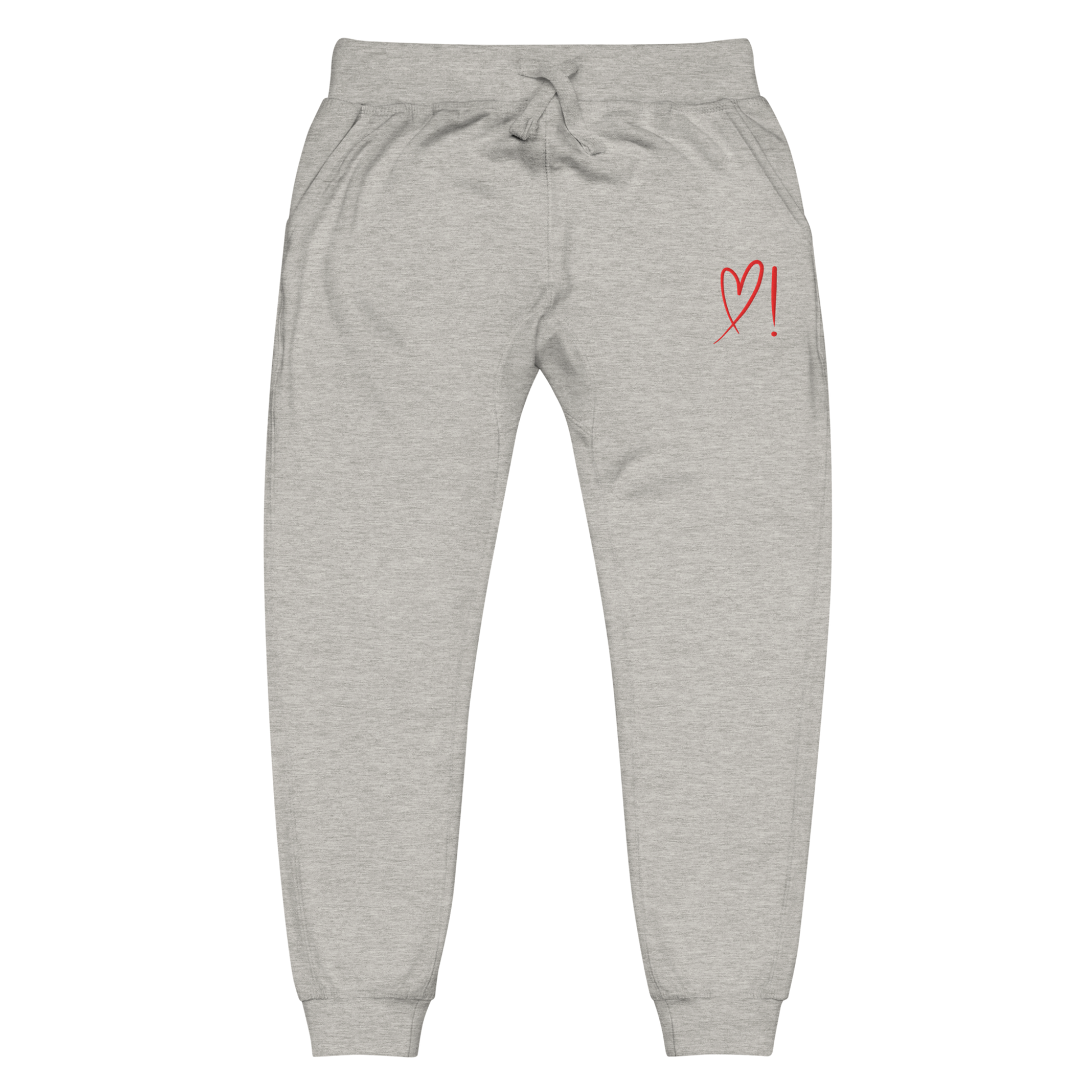 A pair of super soft ankle length unisex sweatpants, there are two pockets on the front and one pocket on the back right. There is a red heart with an exclamation point next to it embroidered on the front left pocket.