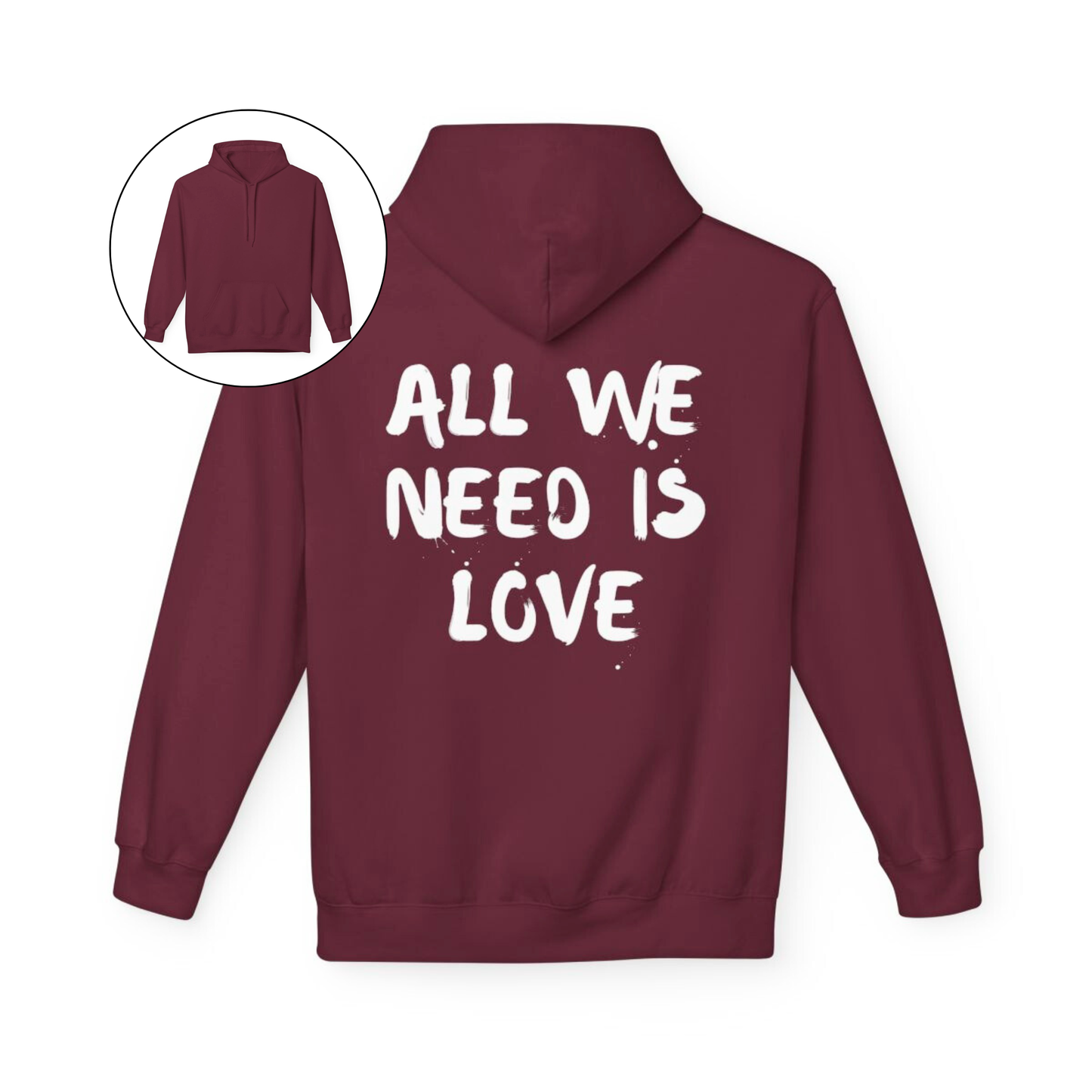 On the back of this custom unisex hoodie are the words all we need is love, the words look like they have been spray painted onto the sweater.