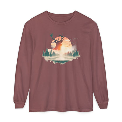 On the front of this custom unisex long sleeve shirt is beautiful landscape at dawn, there is a river in the middle with pine trees on either side, the sun is setting in the background with a large elk in the distance standing in front of the sun.