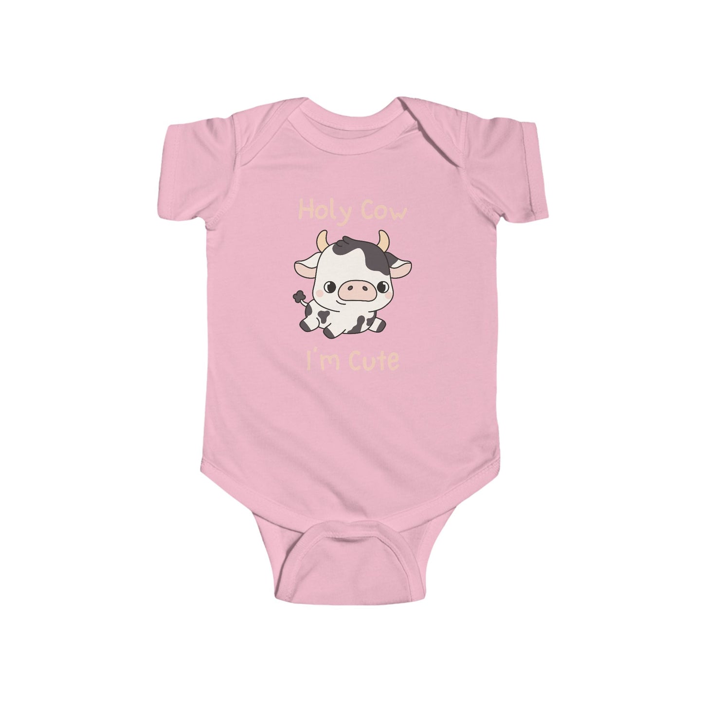 This adorable pink colored super soft bodysuit features an image of a baby cow in the middle with the words 'holy cow I'm cute' in light beige lettering around the image.