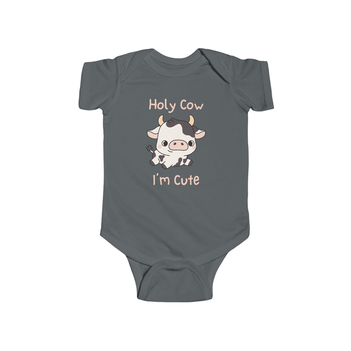 This adorable pink colored super soft bodysuit features an image of a baby cow in the middle with the words 'holy cow I'm cute' in light beige lettering around the image.
