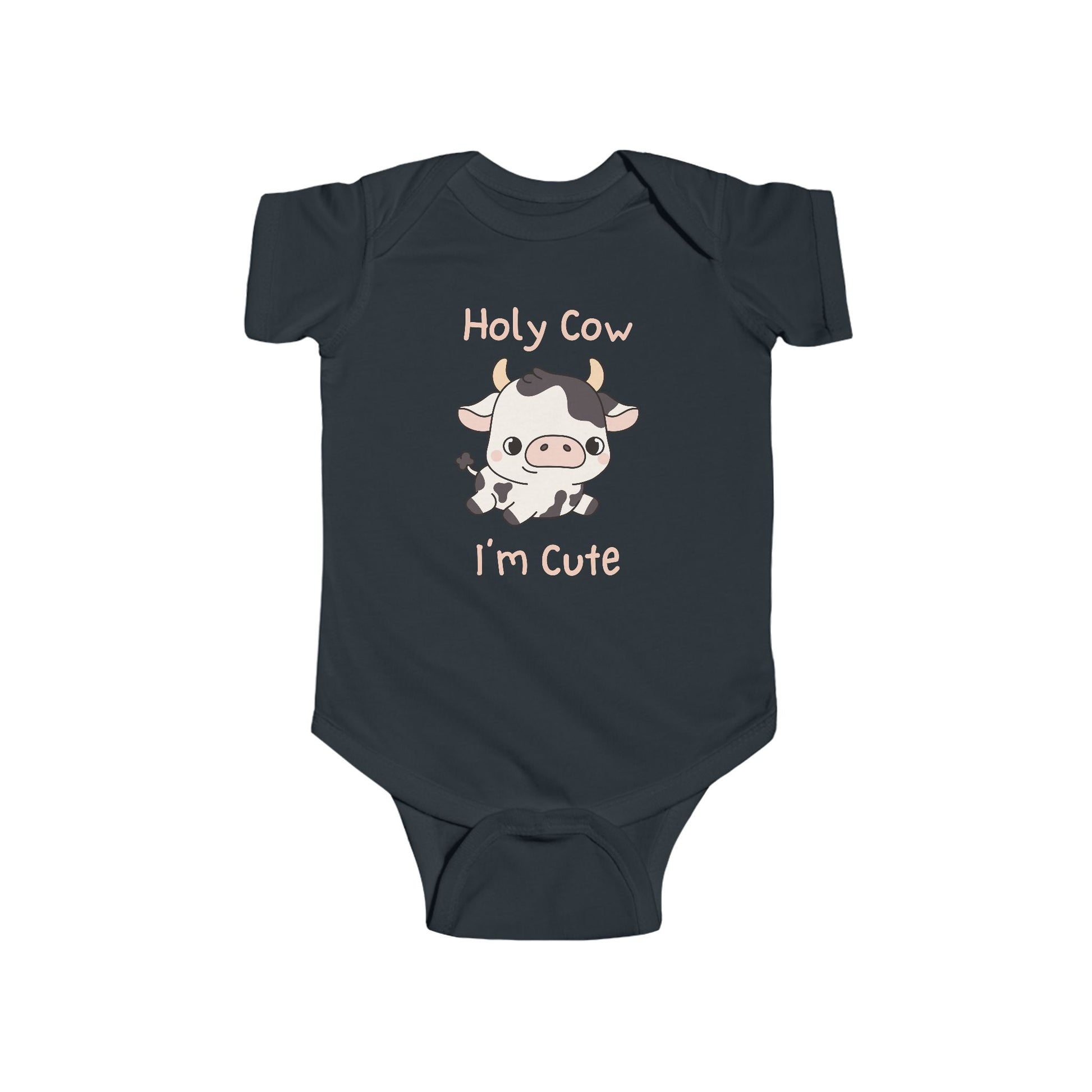This adorable pink colored super soft bodysuit features an image of a baby cow in the middle with the words 'holy cow I'm cute' in light beige lettering around the image.