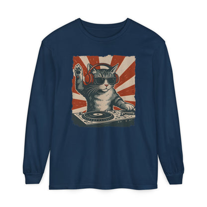 On the front of this custom retro long sleeve shirt is a DJ playing music, except the DJ is a cat that is wearing headphones, there is a vintage red and ivory background behind the cat.