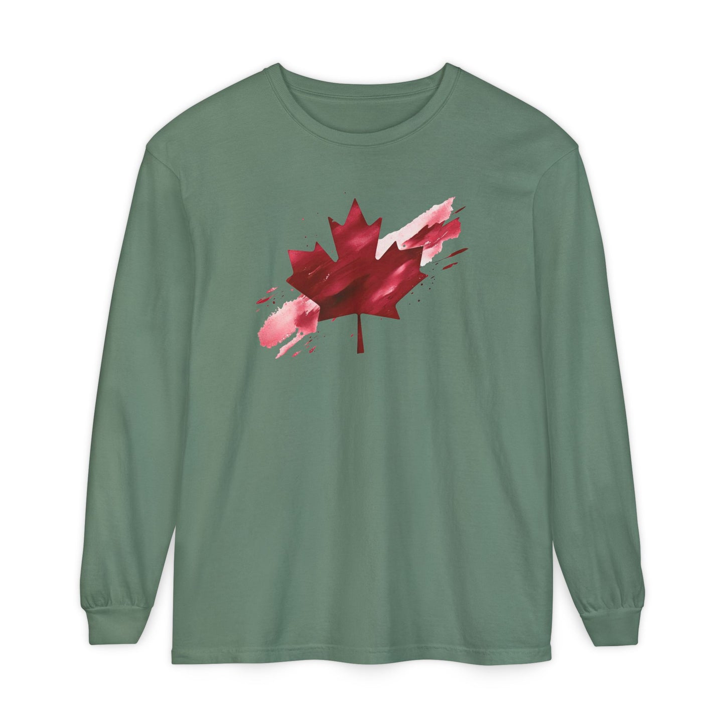 On the front of this unisex long sleeve shirt is an image of a Canadian maple leaf that is bright red, it looks like it has been spray painted onto the front of the shirt.