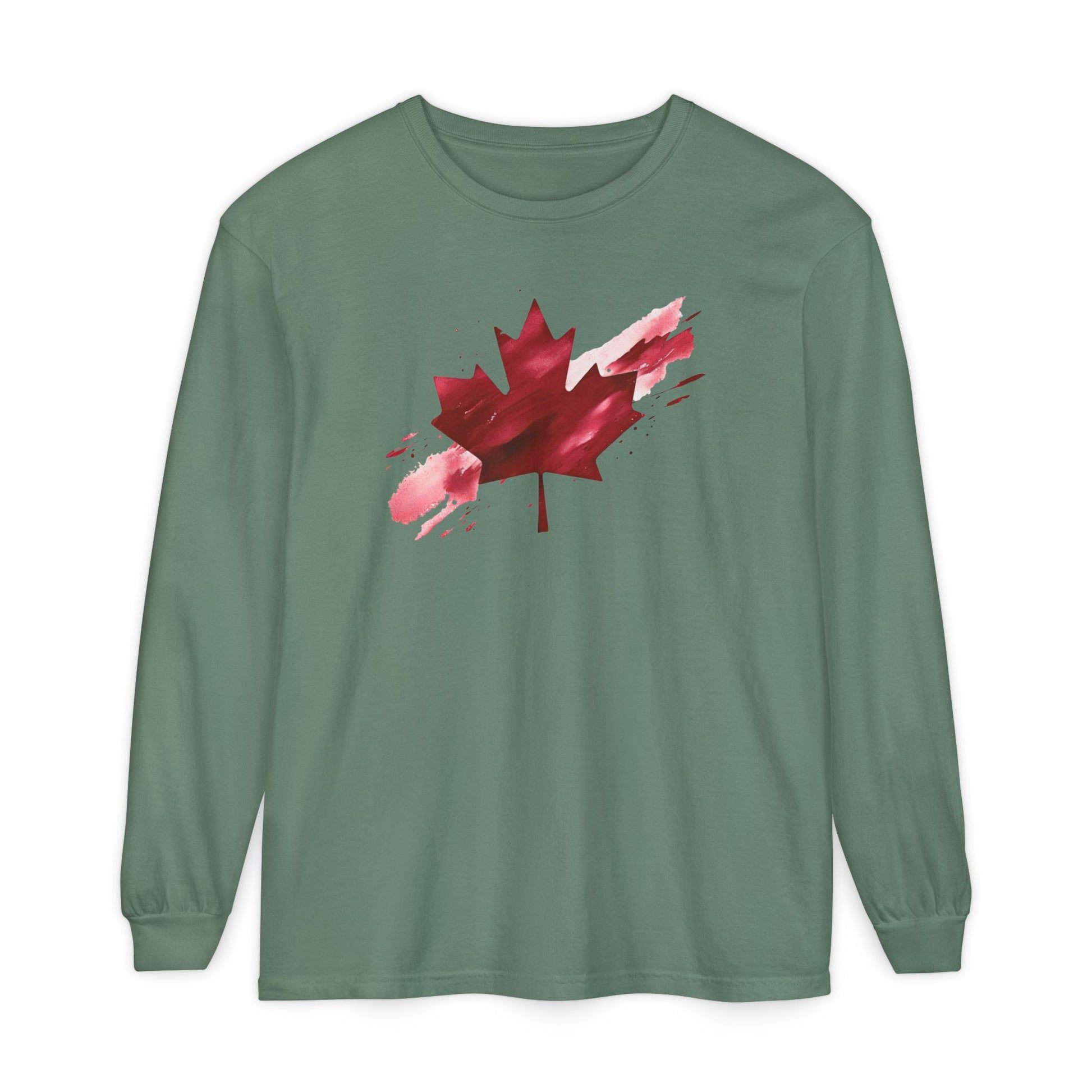 On the front of this unisex long sleeve shirt is an image of a Canadian maple leaf that is bright red, it looks like it has been spray painted onto the front of the shirt.
