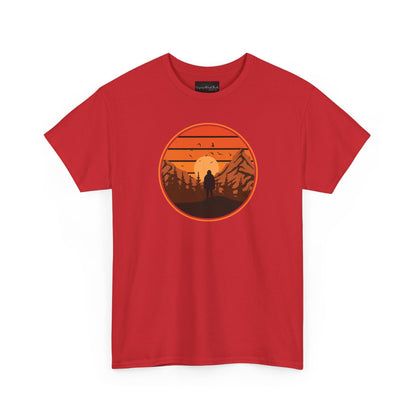 On the front of this custom tee is a large circle on the center of the chest that has an image of bigfoot right in the middle, there is a sun setting with mountain ranges and pine trees in the background.