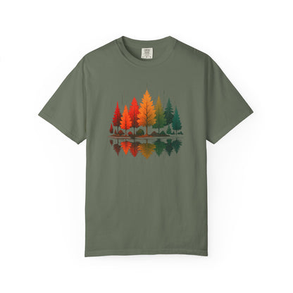 On the front of this custom comfort colors short sleeve shirt is a image of trees in the fall time with all the different fall colors, the trees reflection is right underneath making them look like they are above water.