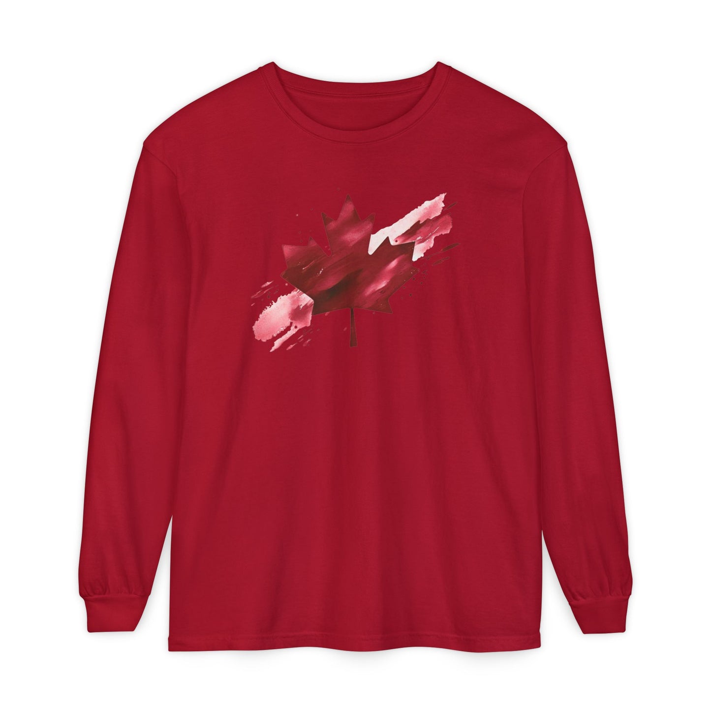On the front of this unisex long sleeve shirt is an image of a Canadian maple leaf that is bright red, it looks like it has been spray painted onto the front of the shirt.