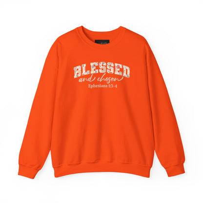 On the front of this custom Christian sweatshirt is the bible verse Blessed and Chosen Ephesians 1:3-4 with the word Blessed being in large bubble letters with a floral pattern on the inside of the letters.