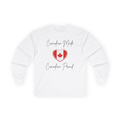 On the front of this custom Canadian patriotic long sleeve t-shirt are the words Canadian Made Canadian Proud in a beautiful cursive font, there is a Canadian flag in the middle that is in the shape of a heart.