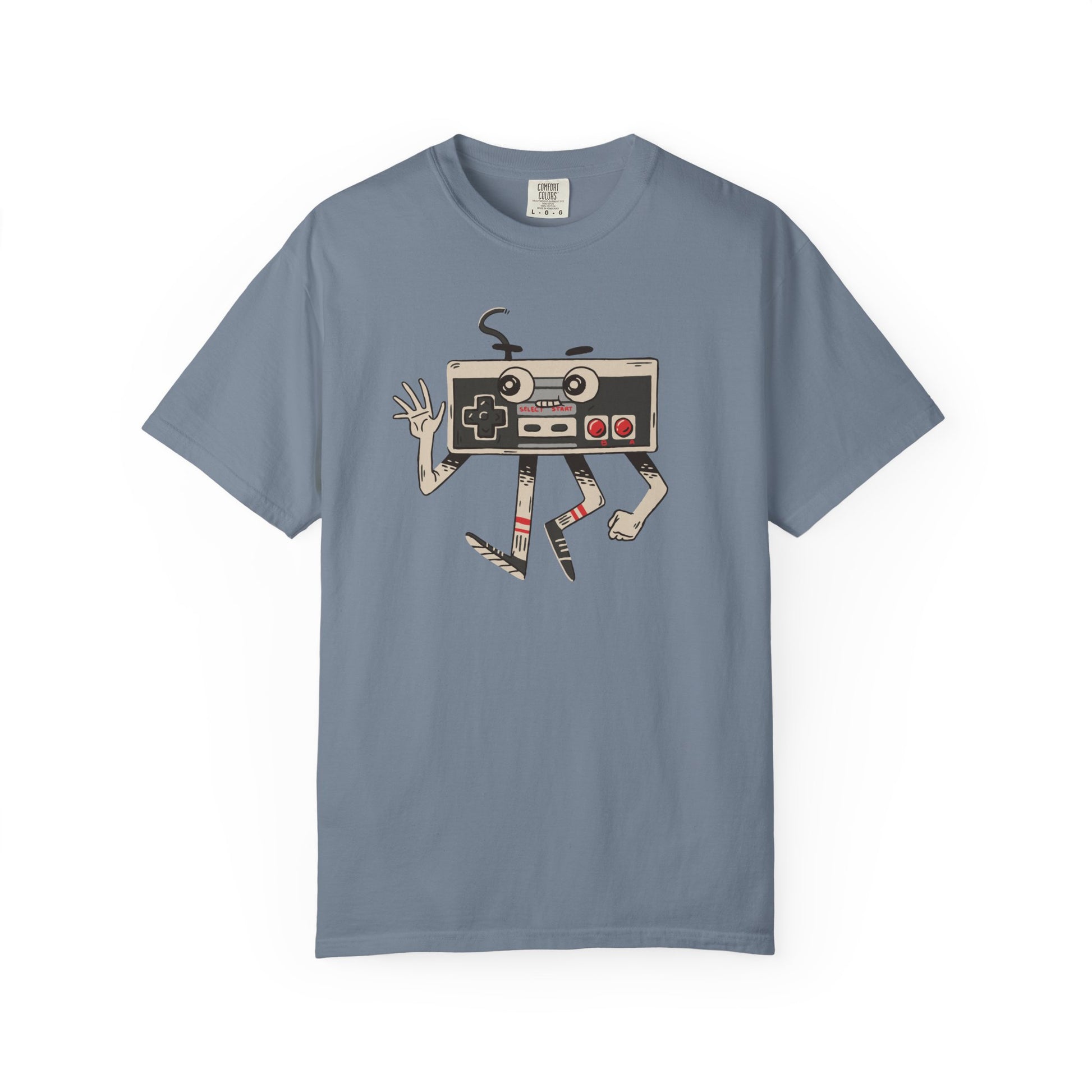 On the front of this custom vintage gaming short sleeve shirt is an image of a old school Nintendo controller, the controller has arms and legs and a face that makes it look like a cartoon character.