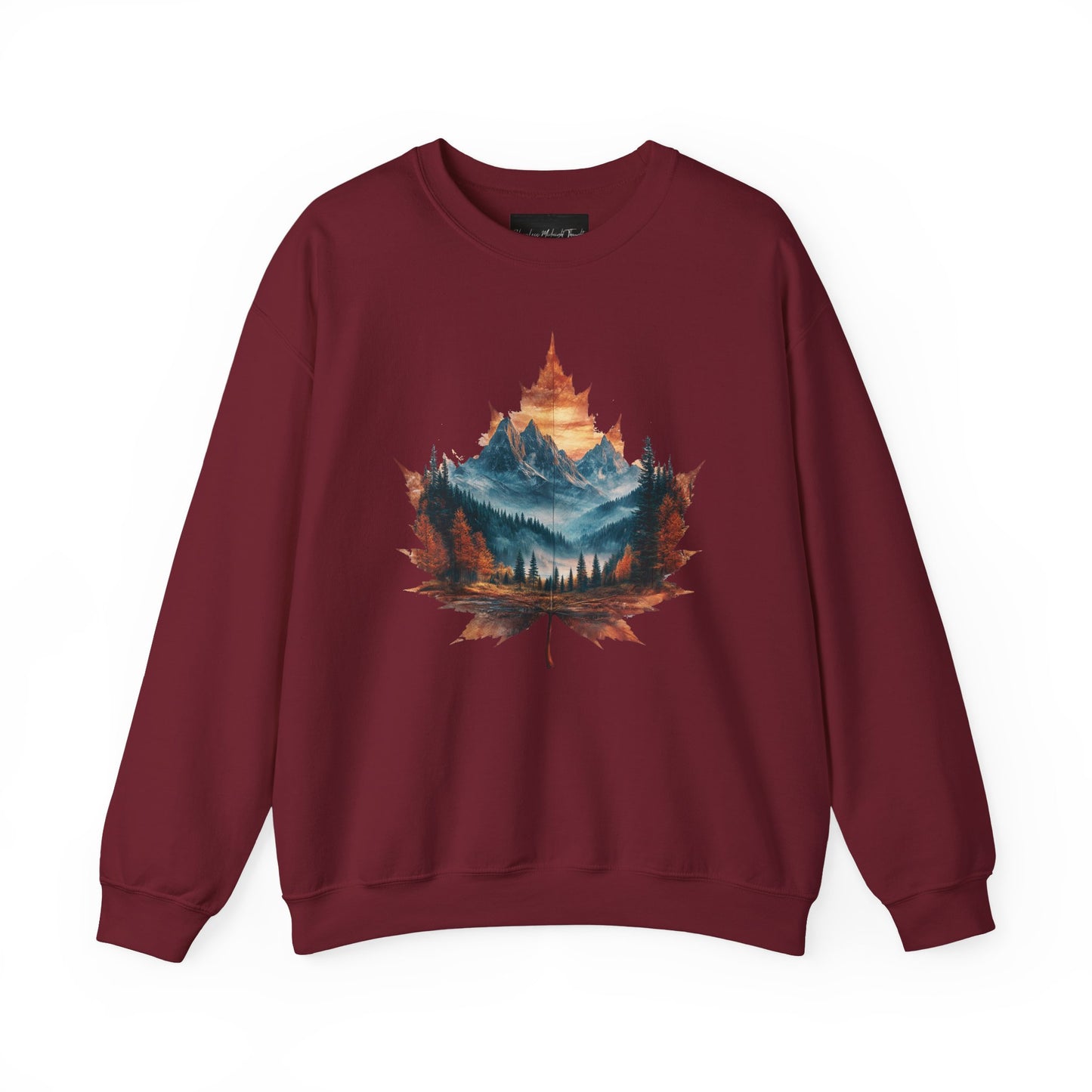 On the front of this Canadian pride sweatshirt is a large maple leaf with the inside of the leaf having a picture of the Rocky Mountains in the fall time.