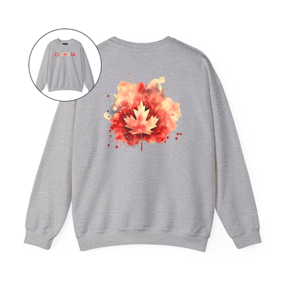 On the front of this Canadian pride pullover sweater is Canada in red and beige letters with a maple leaf in the middle, on the back of the sweater is a large maple leaf that looks like it has been spray painted onto the sweater in red and beige.
