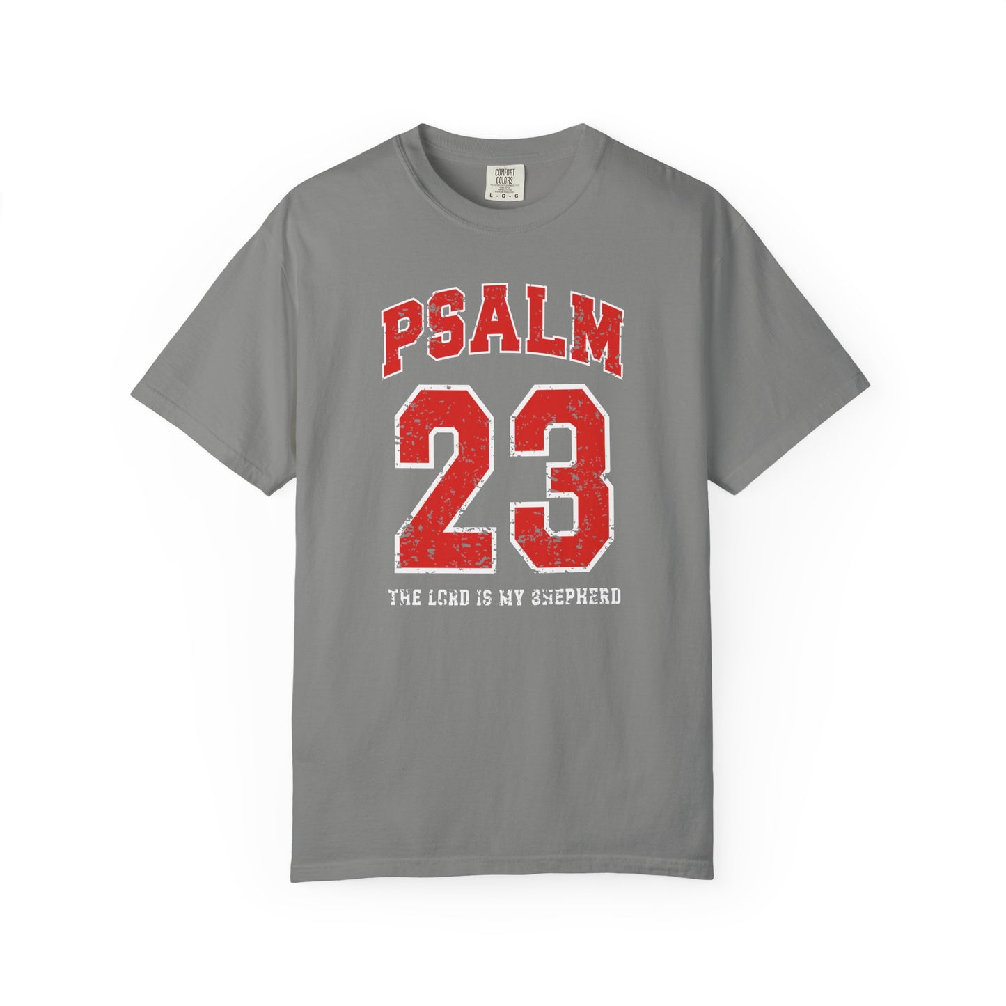 On the front side of this custom vintage t-shirt are the words Psalm 23 The Lord Is My Shepherd, it is with red and white block lettering.