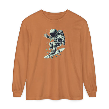 On the front of this custom unisex long sleeve shirt is an image of an astronaut riding a skateboard, there are a bunch of stars around the astronaut.