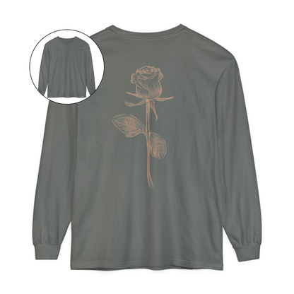 On the back of this custom women's long sleeve tee is a beige colored long stem rose that is the length of the shirt