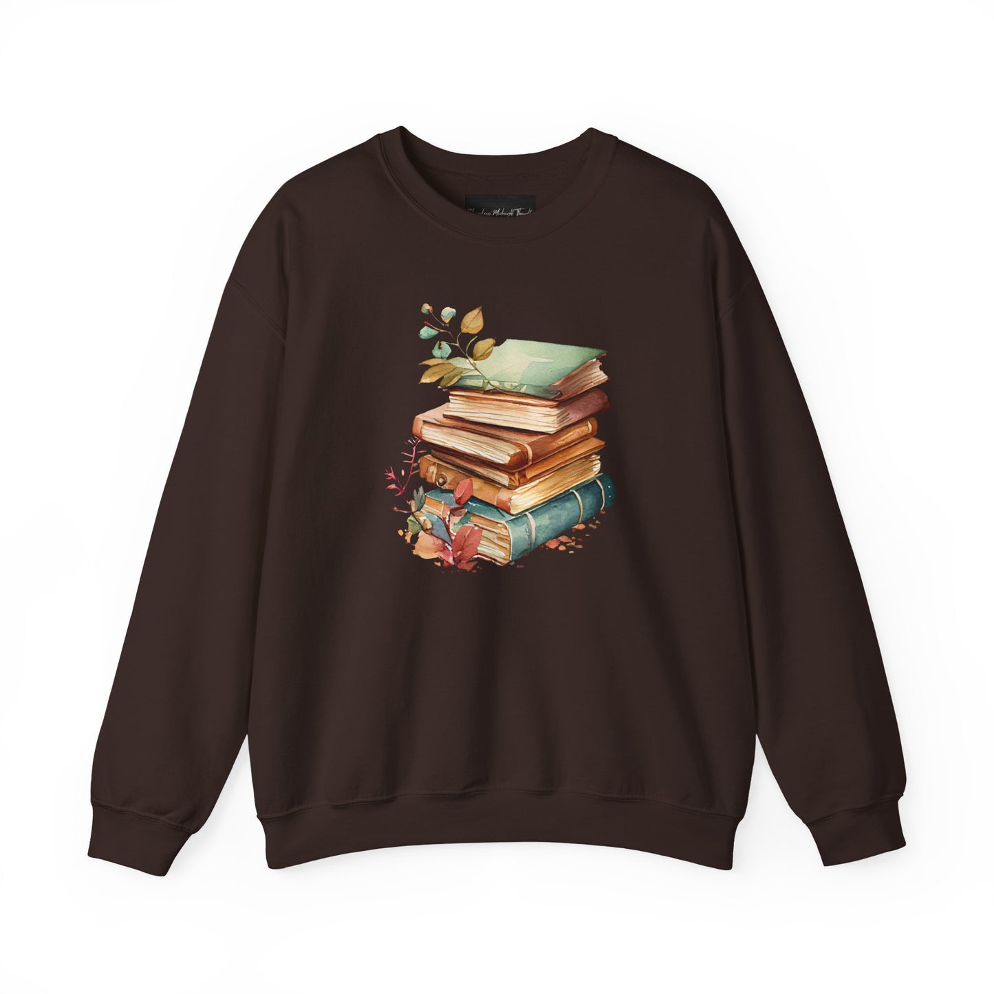 On the front of this custom book lovers sweatshirt is a stack of vintage books with a bunch of wildflowers all around the books.