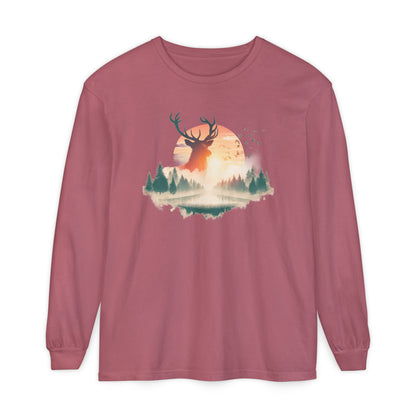 On the front of this custom unisex long sleeve shirt is beautiful landscape at dawn, there is a river in the middle with pine trees on either side, the sun is setting in the background with a large elk in the distance standing in front of the sun.