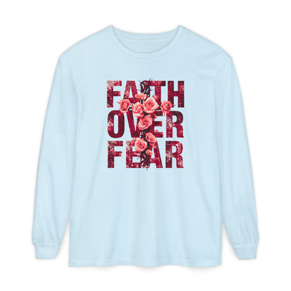 On the front of this Christian vintage long sleeve shirt are the words Faith Over Fear in large block letters with a cross made of thorns in the middle that is covered in roses.