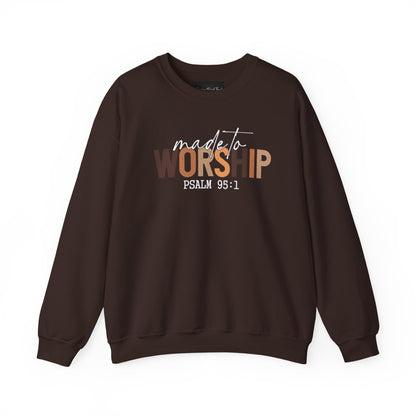 On the front of this Christian pullover sweatshirt it says Made To Worship Psalm 95:1, the word worship is done in large block letters with every letter being a different shade of brown.