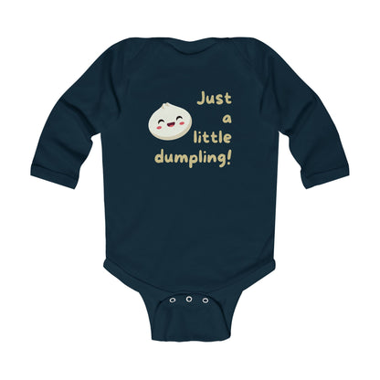 On the front of this custom infant onesie are the words Just A Little Dumpling with a image of a bao dumpling with a happy face next to the wording.