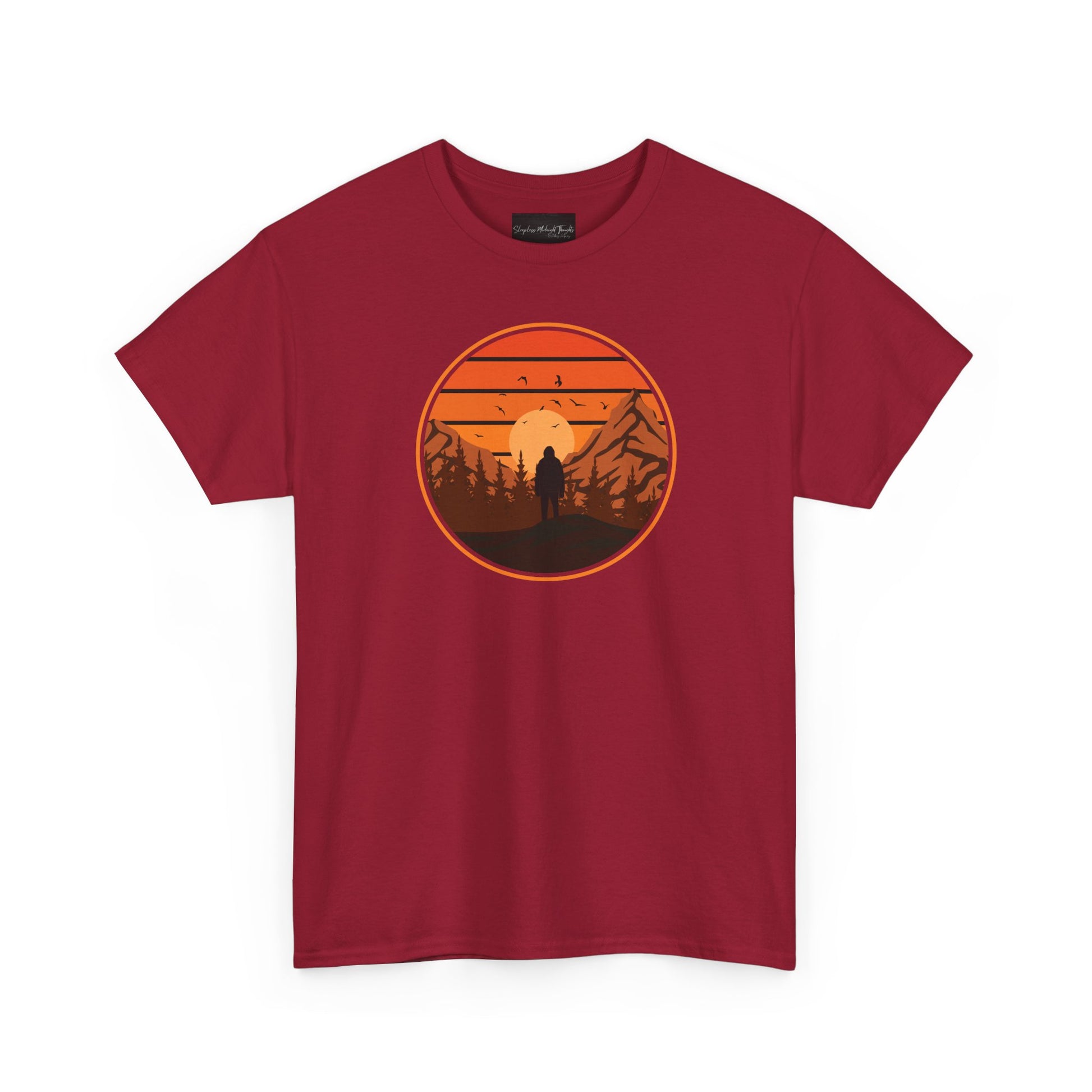 On the front of this custom tee is a large circle on the center of the chest that has an image of bigfoot right in the middle, there is a sun setting with mountain ranges and pine trees in the background.