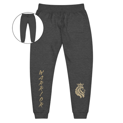 A pair of super soft ankle length unisex sweatpants, there are two pockets on the front and one pocket on the back right, the word warrior is in gold on the back left leg from the knee down and a male lion with a crown on the other