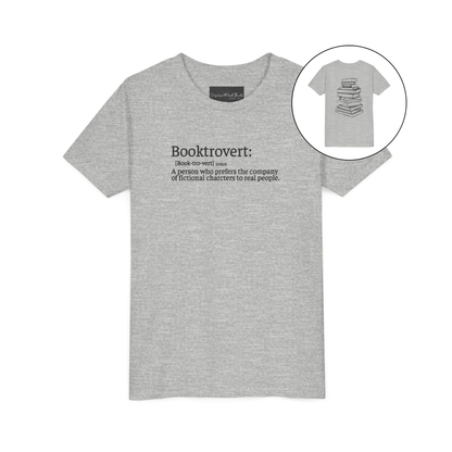 On the front of this custom youth t-shirt it says the word Booktrovert in large letter with the meaning of the words underneath it, on the back of the shirt is an image of a large stack of books.