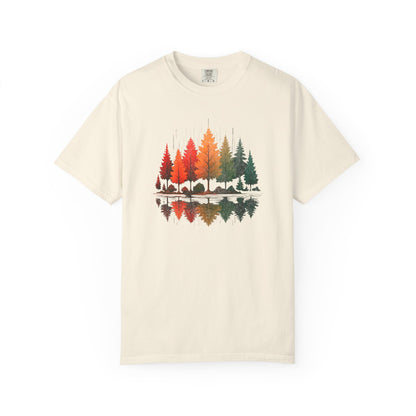 On the front of this custom comfort colors short sleeve shirt is a image of trees in the fall time with all the different fall colors, the trees reflection is right underneath making them look like they are above water.