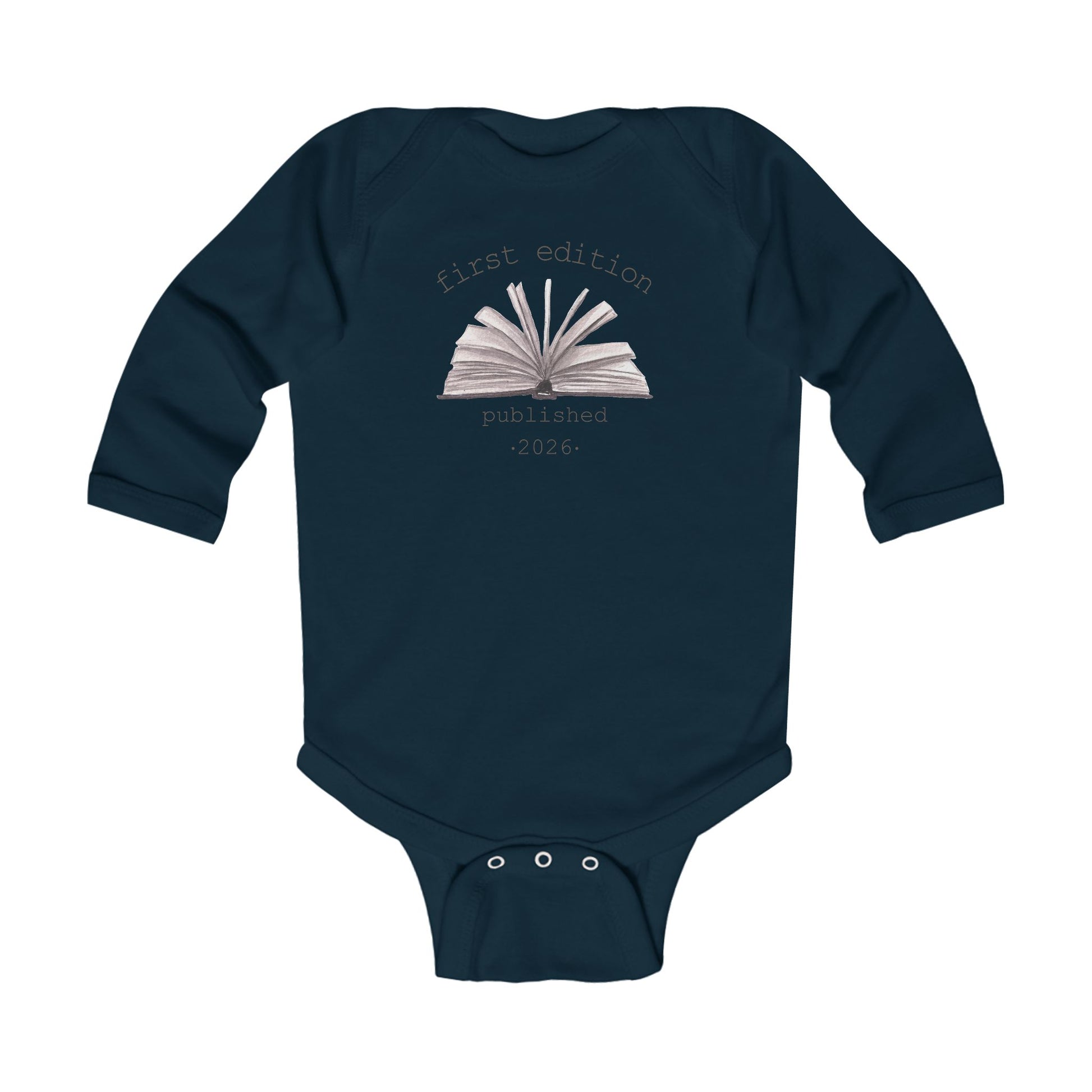 On the front of this custom baby onesie are the words First Edition Published 2026 with an image of an open book in the middle of the wording.