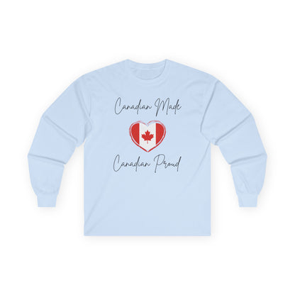 On the front of this custom Canadian patriotic long sleeve t-shirt are the words Canadian Made Canadian Proud in a beautiful cursive font, there is a Canadian flag in the middle that is in the shape of a heart.