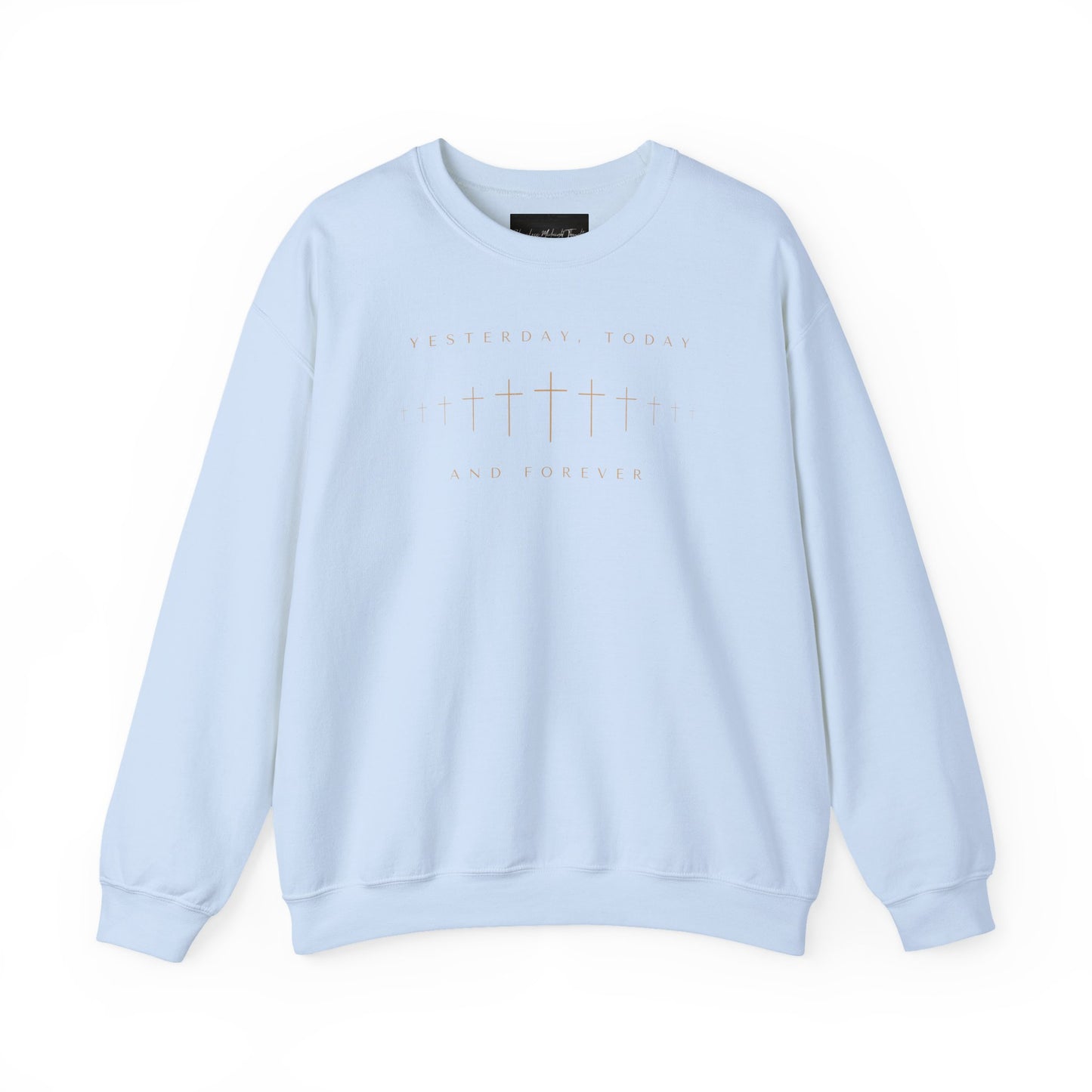 On the front of this Christian pullover sweatshirt is a row of Jesus crosses that look like they are fading into the distance, the words Yesterday, Today and Forever are on the top and the bottom of the crosses.